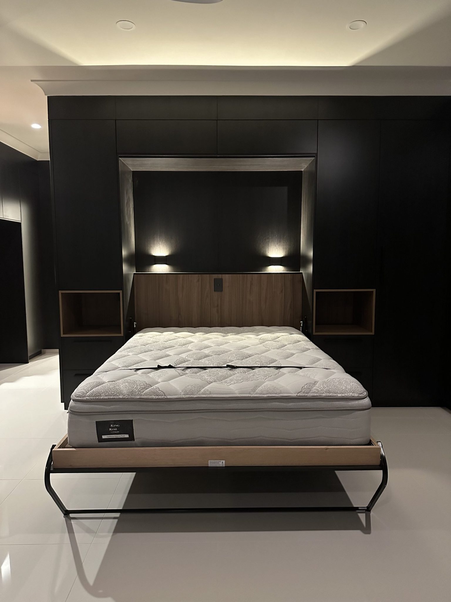 Wall bed in dark room